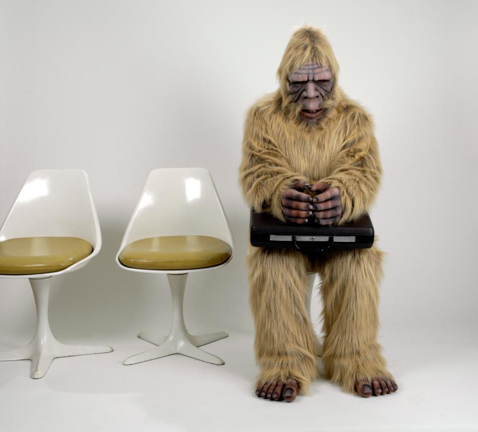 Person in full body costume waiting for an interview